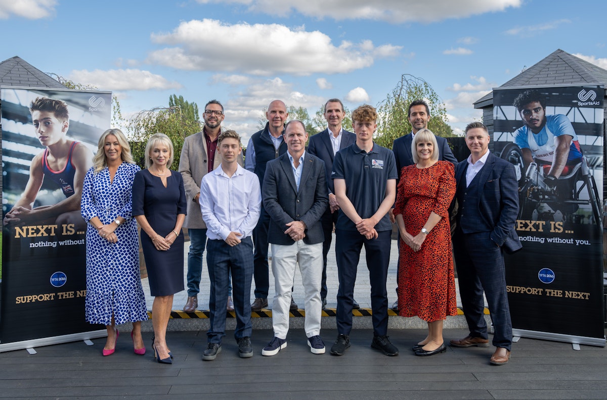Kyran Bracken MBE with grant recipients Hamish Collingridge and Charlie Beeton, and representatives of the Ipswich Sporting Lunch Club sponsors